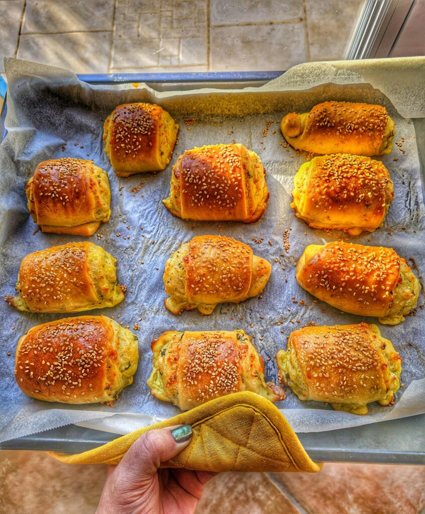 a tray with halloumi cheese pies