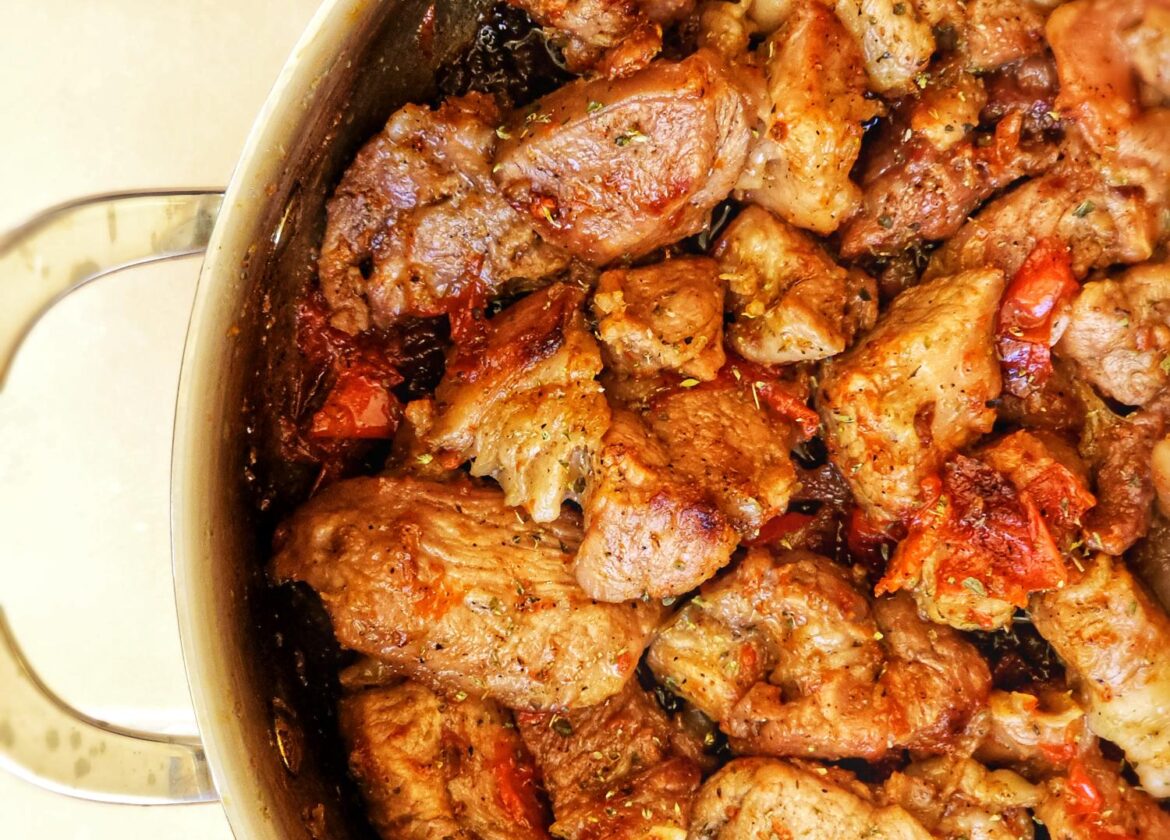 a pan of yummy greek marinated pork belly in beer