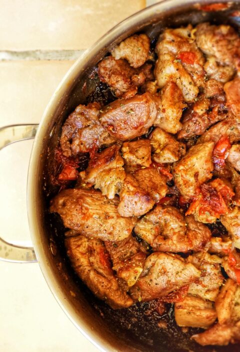 a pan of yummy greek marinated pork belly in beer