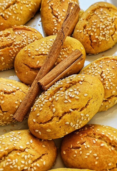 greek olive oil cookies sprinkled with sesame seeds and cinnamon